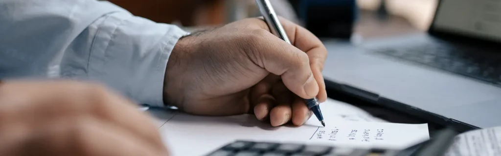 person calculating tax